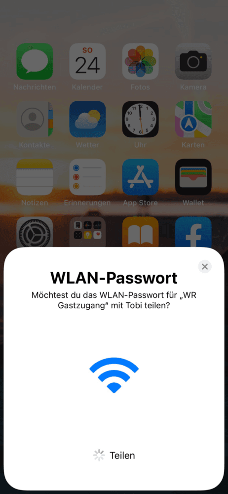 Halte dein entsperrtes iPhone neben das deines Gastes
